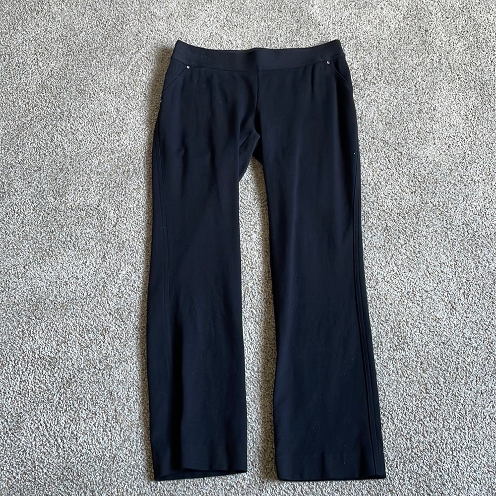 INC black stretchy pants faux pockets on front back zip pockets on back
